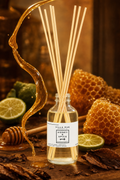 Villa Rue Honey Spice reed diffuser — themed scene