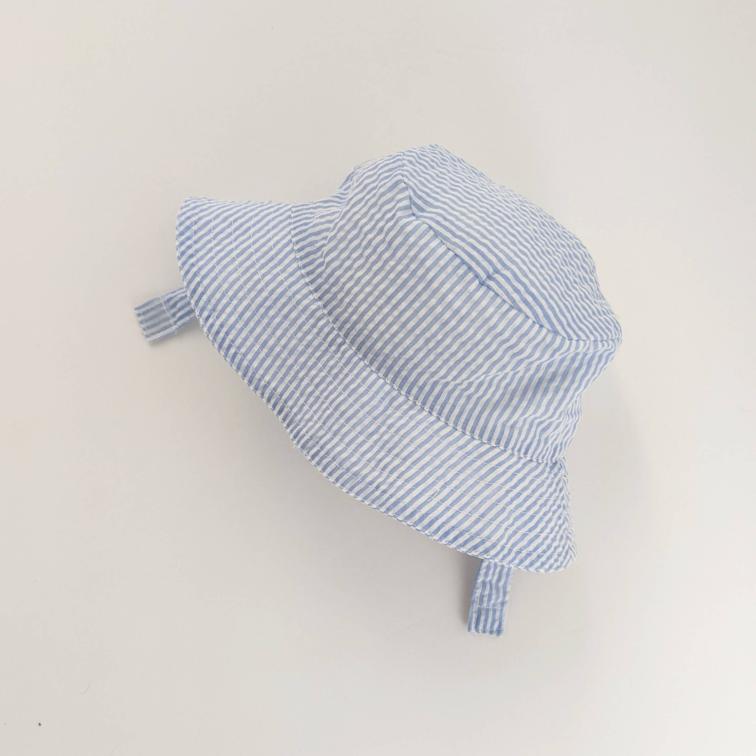 Huggalugs Light Blue Stripe Seersucker Bucket Hat — UPF 25+