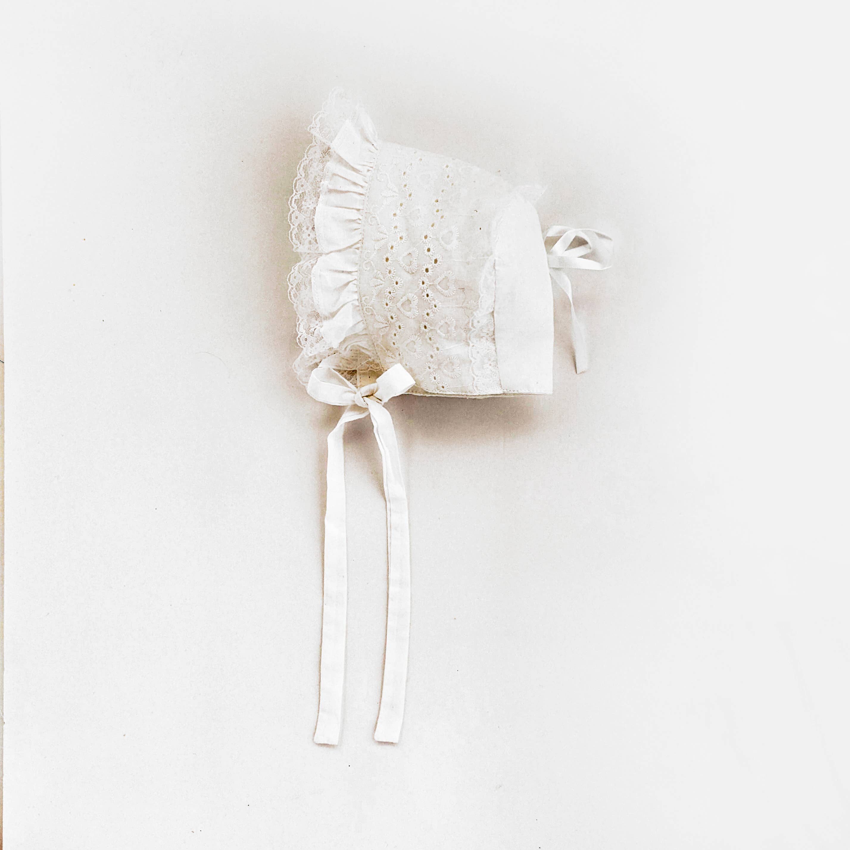 Huggalugs Girls White Heart Eyelet Bonnet